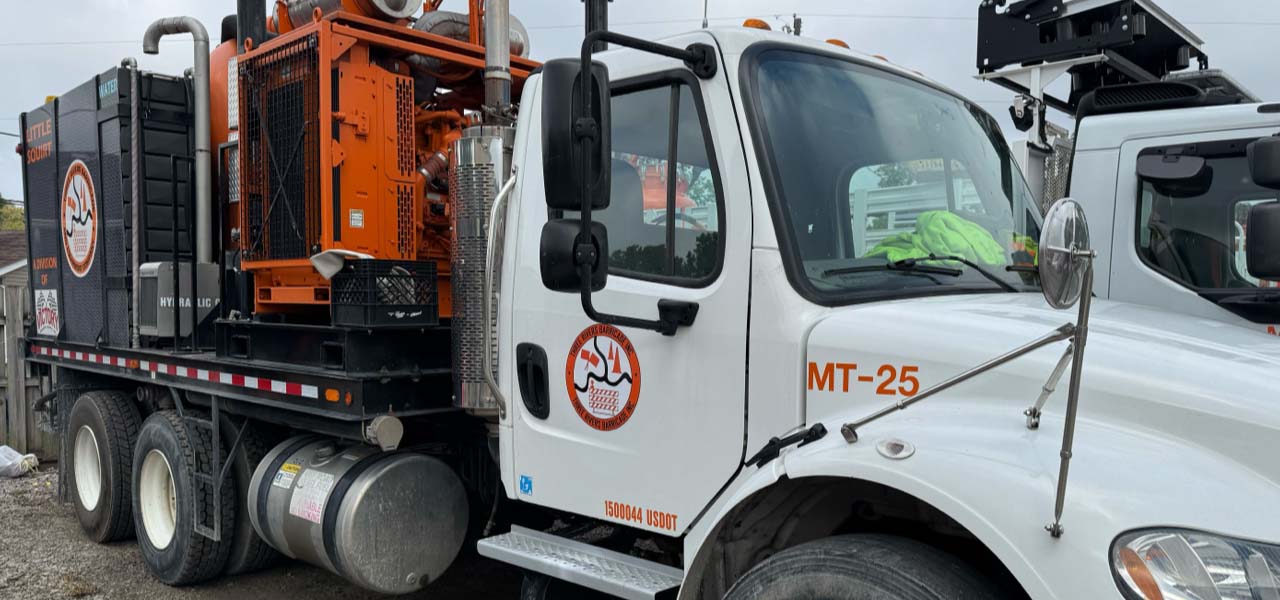 A road paint striping truck. A road paint striping truck.